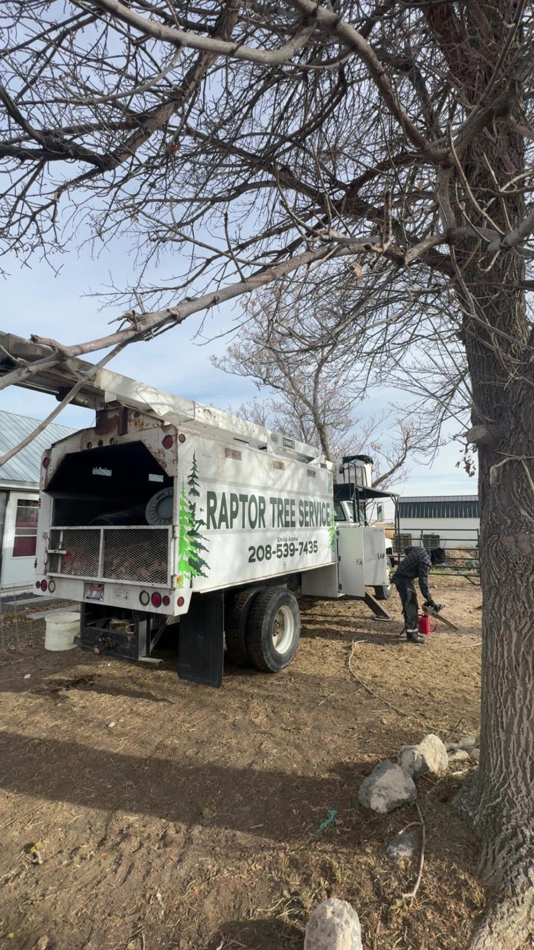 Raptor Tree Service bucket truck on-site in Jerome, ID